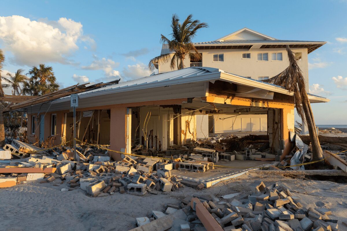 FL.pngHurricane-damaged building in Manasota Key, Florida, with collapsed exterior walls, exposed framing and scattered masonry debris.